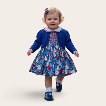 Blythe blue floral hand-smocked girls dress with Peter Pan collar and puff sleeves